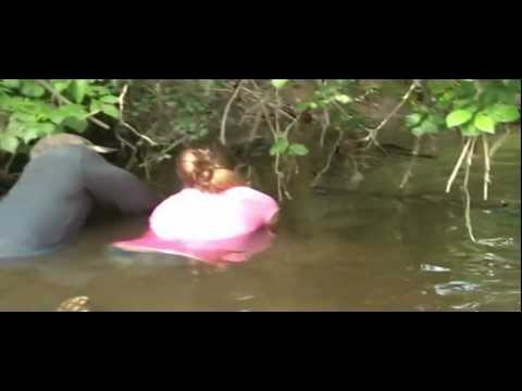 Girl Noodling Snapping Turtle