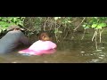 Girl Noodling Snapping Turtle