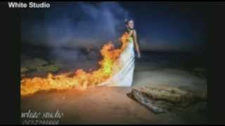 The moment a bride's wedding gown goes up in flames for dramatic Trash The Dress photo shoot