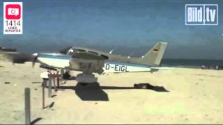 Plane almost lands on sunbather on beach- Fails landing.