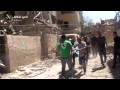 فتاة تطلب من الثوار عدم تصويرها لانها غير محجبة اثناء انتشالها من تحت الانقاض
