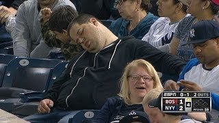 Fan sleeps in stands during game vs. Red Sox