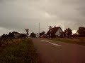 Danish IC3 train at railroad crossing