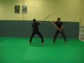 Application kata Yoseikan Budo, exercice de batons à deux.