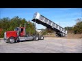 Kenworth W900L Dumping Frameless Dump Trailer