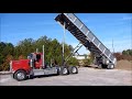 Kenworth W900L Dumping Frameless Dump Trailer