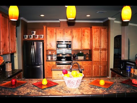Watch Video of MAD MANAGER SALE!! New 32483V Model- 1,488 Sq. Feet! Now Only $52,900!!