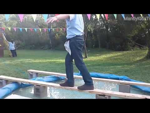 Mom and daughter video tape Dad's funny obstacle course challenge