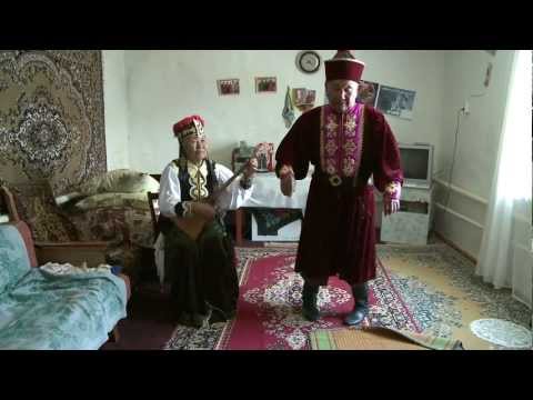 Kalmyk traditional song and dance performed by Nyamin Manjieyev and Nina Manjieyeva