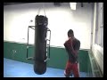 MMA fighter training on a heavy bag with the Boxing Box