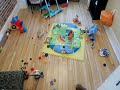 Time lapse of a baby playing with his toys