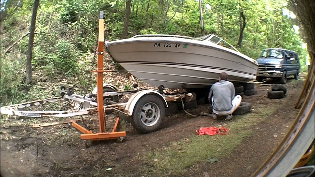 Removing a 19' Boat from a Trailer on Land - YouTube