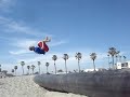 Trying flips on the beach