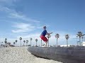 Trying flips on the beach