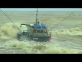 Incredible video - fishing boats in rough sea