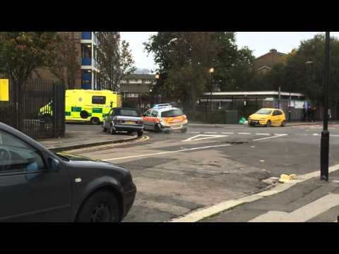 Hình ảnh trong video London Ambulance Crashes onto a Police Car At