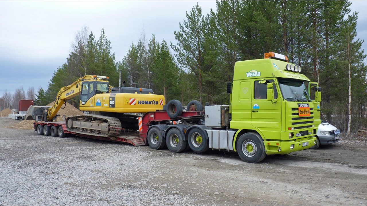 Heavy haulage Scania 143 V8 500 8x4 with a Komatsu PC450 ...