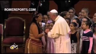 Pope Francis greets a group of indigenous people