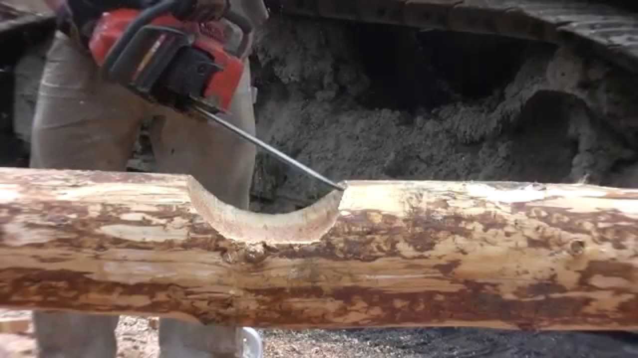 How to Notch a Log for Building a Log Home or Log Cabin Saddle Scribe