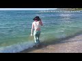 Jessica in Hawaii - wetlook on the beach - swimming with clothes on