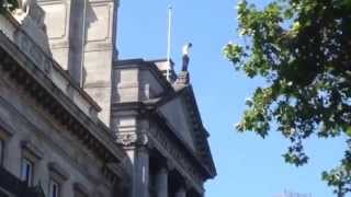 Guy standing on top of the Abercrombie building