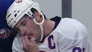 New York Islanders forward John Tavares pulls out his tooth