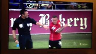 Craig Bellamy pours water over the referee