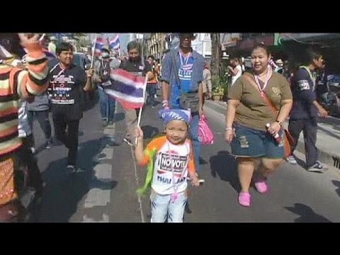 Anti-government protesters in Thailand are calling for an election boycott ahead of Sunday\'s vote.
...

euronews, the most watched news channel in Europe
     Subscribe for your daily dose of international news, curated and explained:http://eurone.ws/10ZCK4a
     Euronews is available in 13 other languages: http://eurone.ws/17moBCU

http://www.euronews.com/2014/01/31/thai-protesters-call-for-election-boycott
Anti-government protesters in Thailand are calling for an election boycott ahead of Sunday\'s vote.

In Bangkok demonstrators have blocked major intersections and flyovers for weeks. 

Their vow to disrupt Sunday\'s vote comes after they closed down polling stations in the capital and the south during advanced voting the weekend before, provoking anger among voters.

Head of the election commission, Puchong Nutrawong said polling stations in 49 of Bangkok\'s 50 districts were forced shut.

Protesters say they want to bring down Prime Minister Yingluck Shinawatra, then set up a \