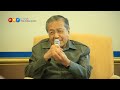 Stop the violence, Mahathir tells Muslims