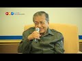Stop the violence, Mahathir tells Muslims