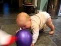 Baby Cam laughing at balloon being kicked at him!
