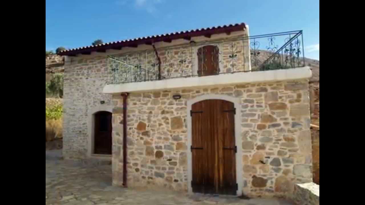 Seaside Real Estate in Greece Traditional stone house for sale in