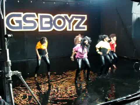 Dancer falls in water during special pyrotechnic lighting effects for GS BOYZ music video shoot.