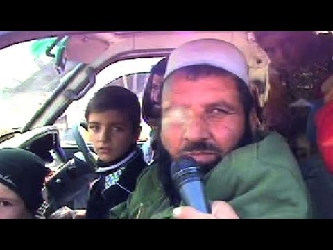 People flee Pakistani anti-Taliban air strikes in the North Waziristan tribal region. Duration: 01:00