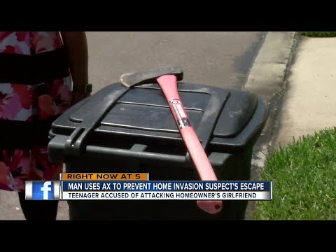 Download Axe-wielding boyfriend saves girlfriend from home invasion in Pinellas Park
