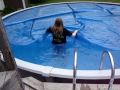 pushing amanda in the pool