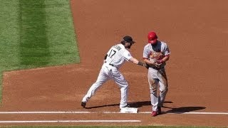 Helton pulls off hidden-ball trick on pickoff