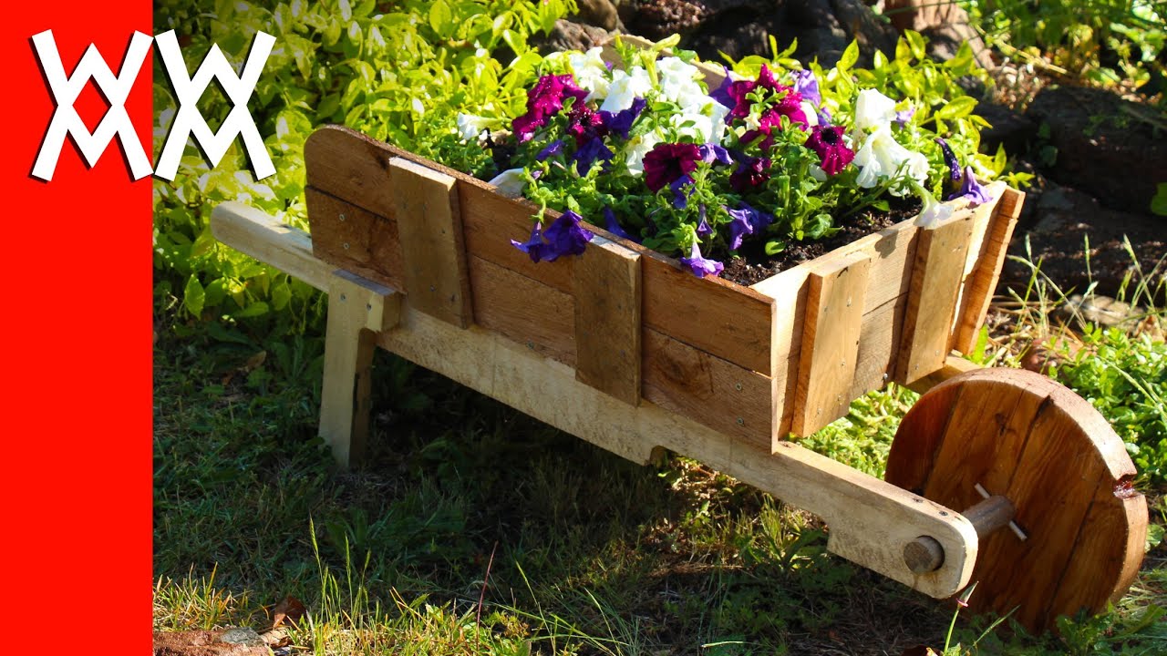 Make a rustic wheelbarrow garden planter. Easy DIY weekend project