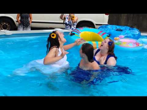 Sister jumps into pool wearing wedding dress