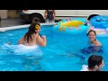Sister jumps into pool wearing wedding dress