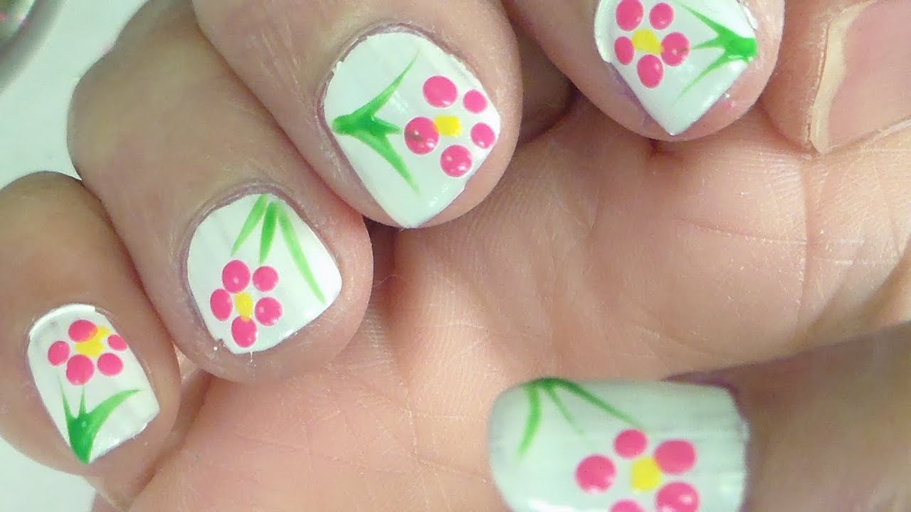 2. Step-by-Step Flower Nail Art Design - wide 9