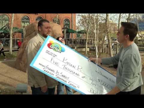 $5,000 Holiday Scratch Giving Is Sweet Shopping Spree Winner - We surprised Brian yesterday downtown to let him know that he had won the $5,000 Shopping Spree. Brian participated in our Giving Is Sweet contest and lo and behold, Merry Christmas!!