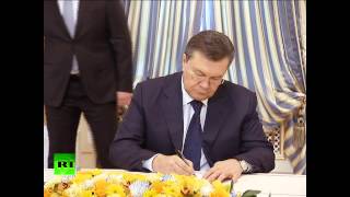 Виктор Янукович подписал соглашение о преодолении кризиса на Украине