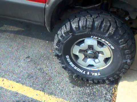 Truck has mean big wicked lugged Thornbird tires - YouTube