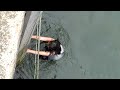 Crazy girl jumps 15 feet into canal