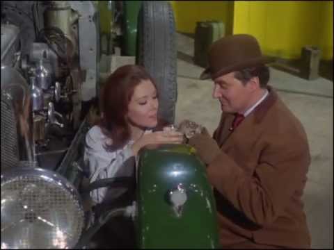 Youtube video - Steed’s mechanic tells him he has a ghost in the engine - then ends up beinbg revealed as Mrs. Peel and they share a glass of champagne