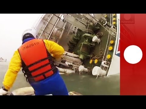 South Korean TV show footage of the sunken passenger ferry, as coaost guard patrols continue their efforts to rescue passengers from it.

The passenger ferry, identified as the Sewol, was carrying 477 people, when it listed badly on its side and capsized as it neared Jeju island, about 100 km (60 miles) south of the Korean peninsula. 164 were confirmed rescued, while two are reported to have died and more than 300 remain unaccounted for.

What is in the news today? Click to watch: http://eurone.ws/1kb2gOl

euronews: the most watched news channel in Europe
Subscribe! http://eurone.ws/10ZCK4a

euronews is available in 14 languages: http://eurone.ws/17moBCU

In English:
Website: http://www.euronews.com/news
Facebook: http://www.facebook.com/euronews
Twitter: http://twitter.com/euronews
Google+: http://google.com/+euronews
VKontakte: http://vk.com/en.euronews