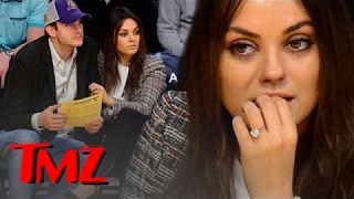 Mila Kunis must be left handed because she can't stop showing off her engagement ring!!!