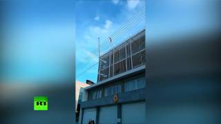 Киприоты сорвали флаг с немецкого посольства