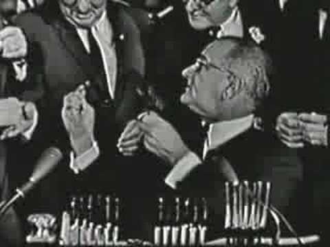 President Johnson signs 1964 Civil Rights Bill